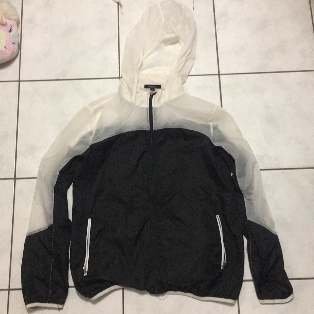 Really thin somewhat of a Raincoat/Breaker